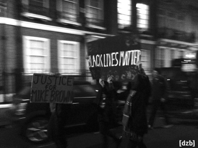 Protestors holding sign that says Black Lives Matter